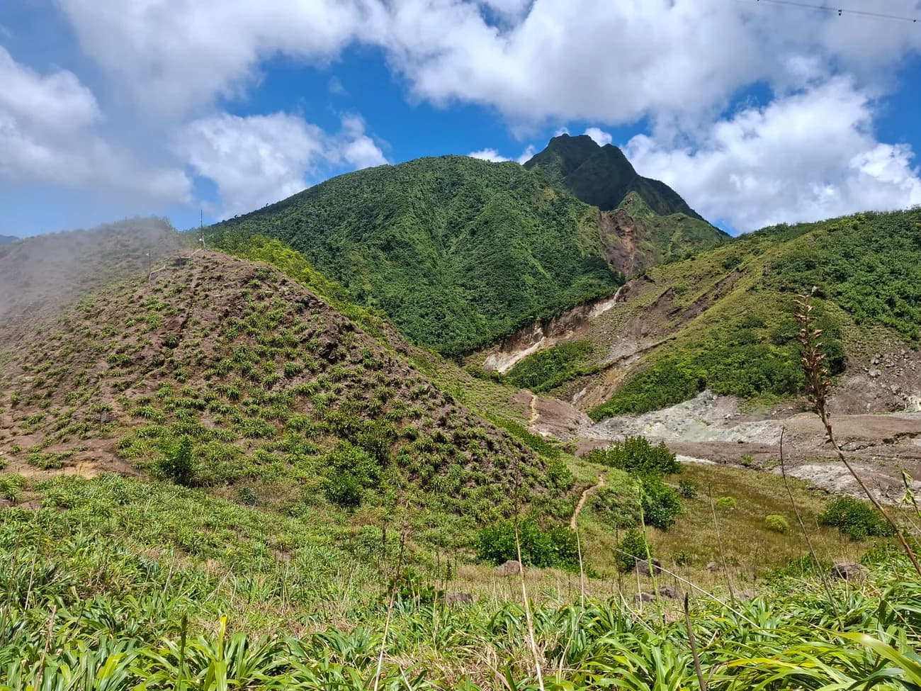 Hikers meeting at the Boiling Lake trailhead in Dominica, ready to begin the guided hike
