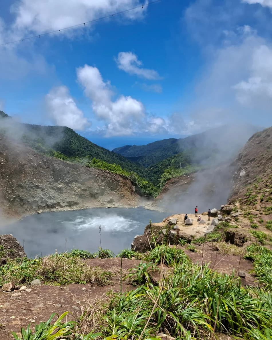 Boiling Lake volcanic crater, Dominica — steam rising from the turquoise boiling water